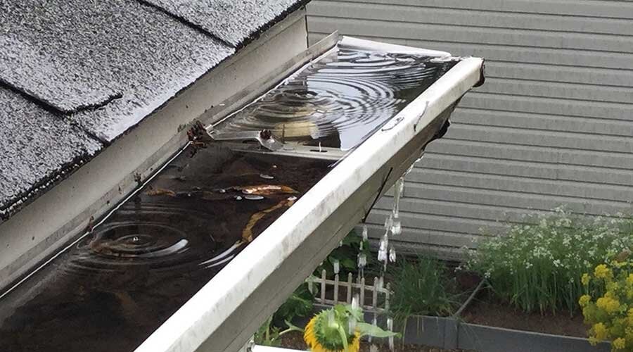 Can a Clogged Gutter Cause a Roof Leak